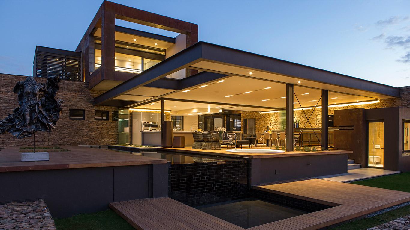 Luxury modern home exterior at dusk